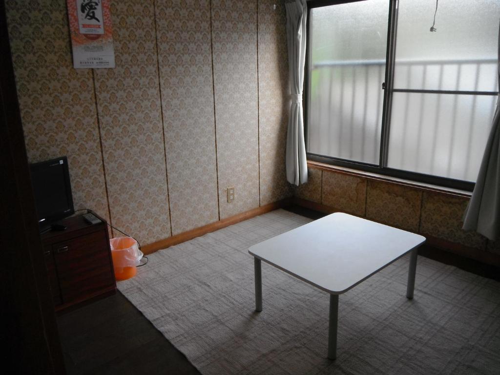 Hotel Minshuku Iwakawa Jakušima Pokoj fotografie