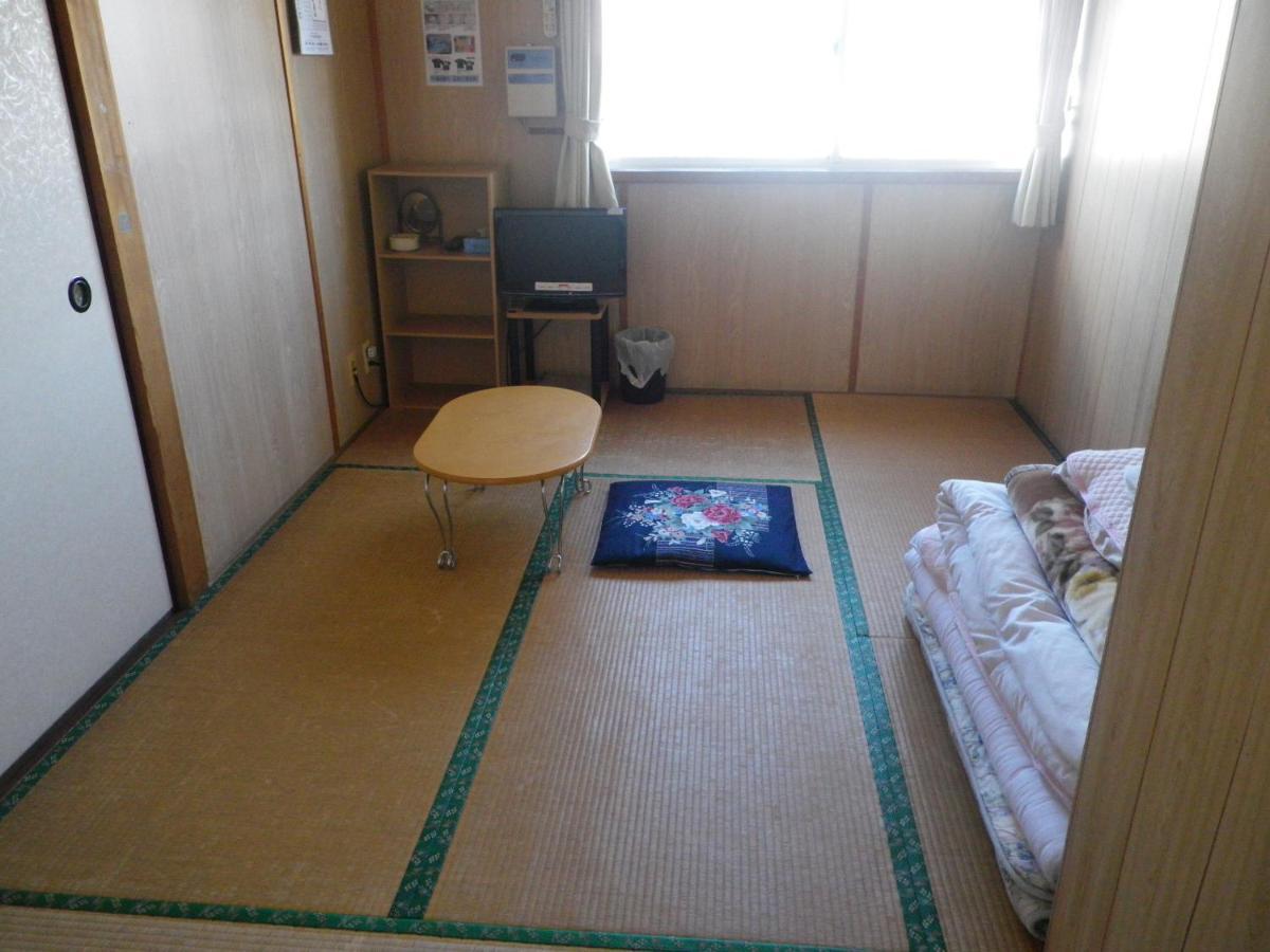 Hotel Minshuku Iwakawa Jakušima Pokoj fotografie